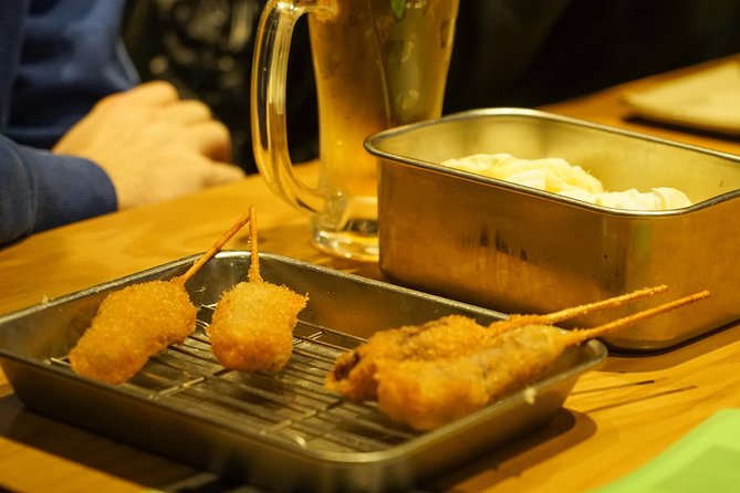 Osaka Local Foodie Walking Tour in Dotonbori and Shinsekai - Jan-Jan Yokocho and the older face of Osaka