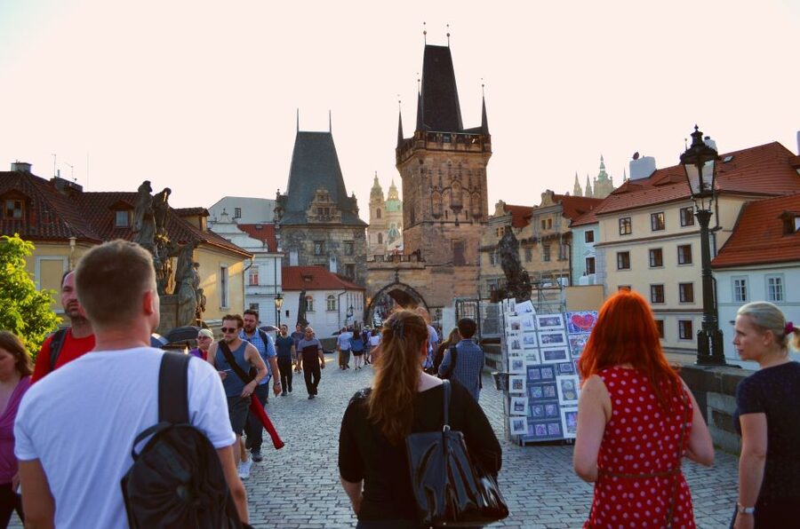 Panoramic Views of Prague Evening Walking Tour - Languages, guides, and the human side of the walk