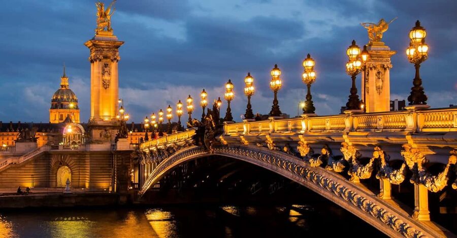 Paris: Illuminated Walking Tour - Paris at dusk, from Opera to Invalides
