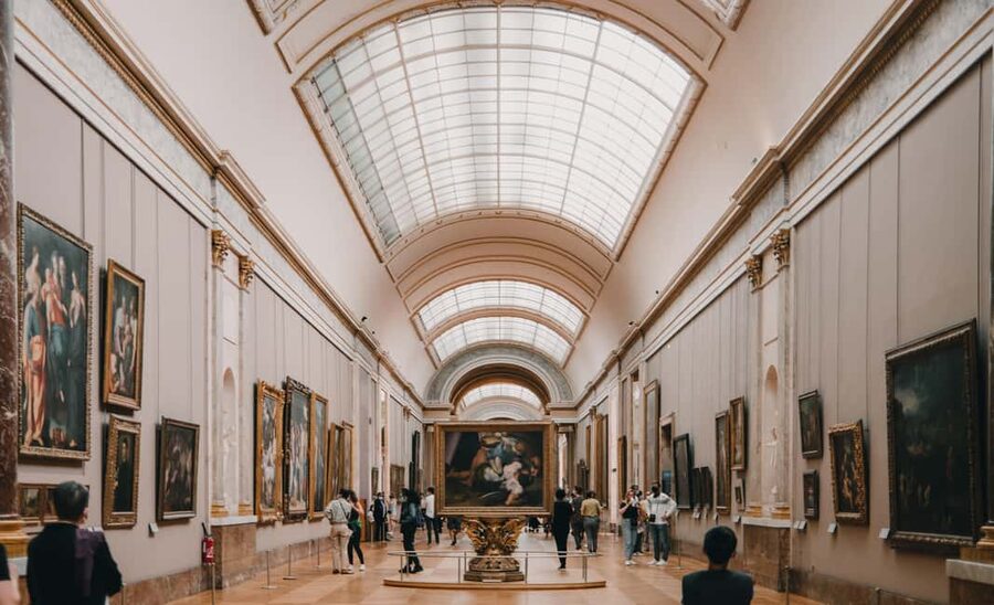 Paris: Louvre Museum Entry Ticket and Garden Walking Tour - Entering the Louvre with a timed ticket