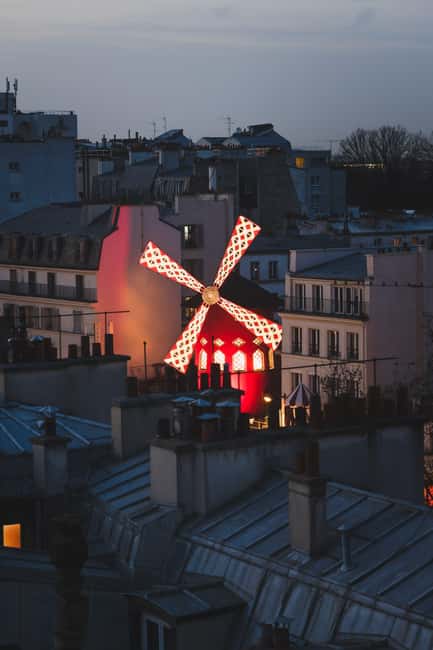 Paris: Montmartre Guided Walking Tour - Moulin de la Galette and the artists’ neighborhood