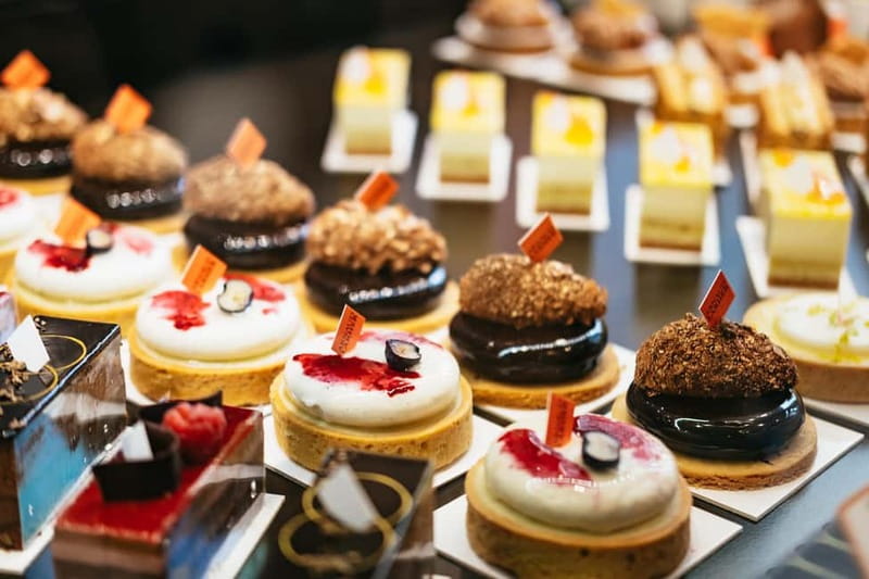 Paris: Saint Germain des Prés Guided Foodie Walking Tour - Sweet stops: pastry, chocolate, and French craft