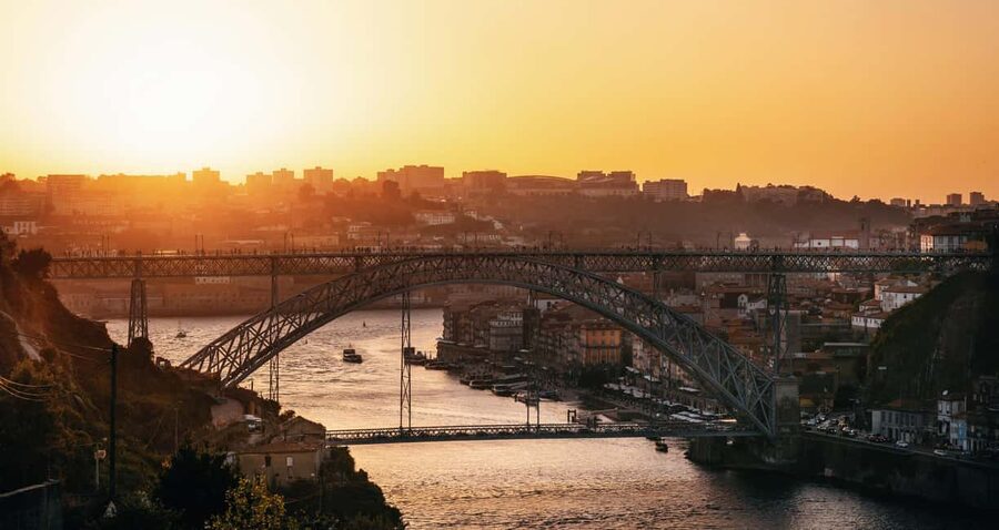 Porto: Sunset Walking Tour with Port Wine and Views - Clérigos Tower and Porto’s church secrets