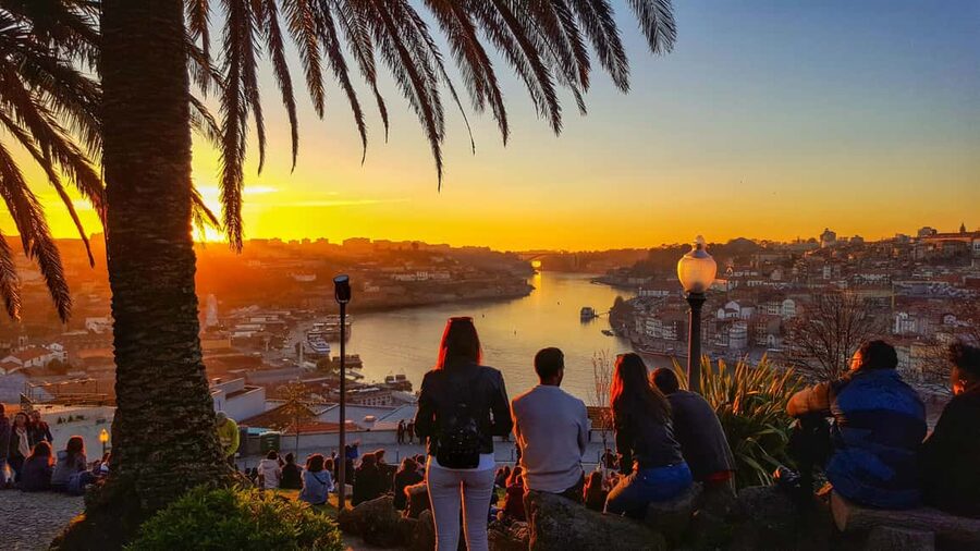 Porto: Sunset Walking Tour with Port Wine and Views - Porto Cathedral and the crossing to Gaia