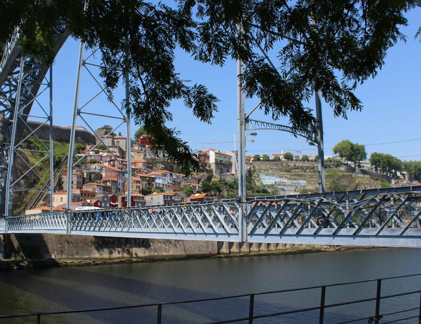 Porto: Wine Tasting with Tapas Walking Tour - Walking through old Porto and Ribeira