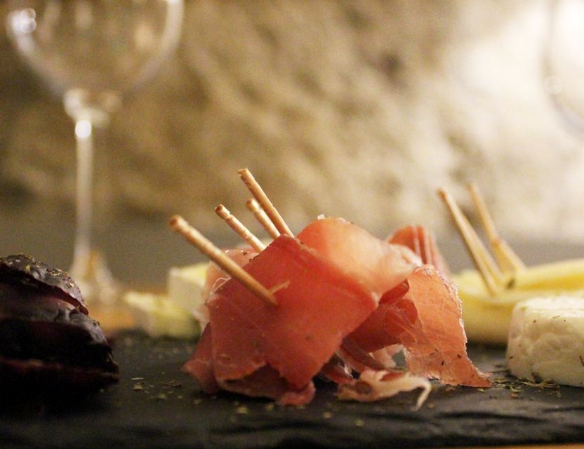 Porto: Wine Tasting with Tapas Walking Tour - Vinho Verde, Douro bottles, and Portuguese snacks
