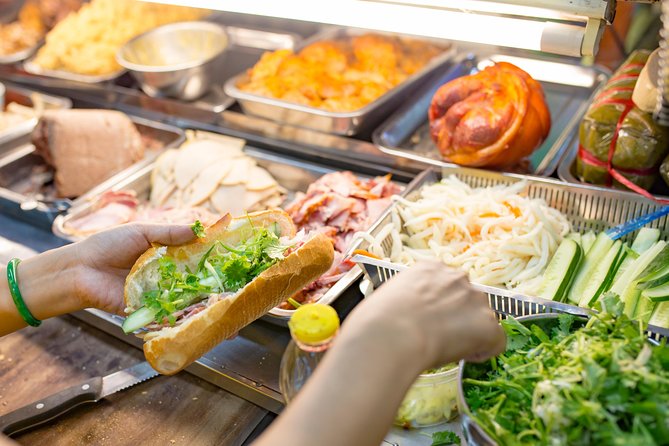 Private Street Food Evening Walking Tour in Ho Chi Minh City - Six stops, nine dishes, and more than dinner