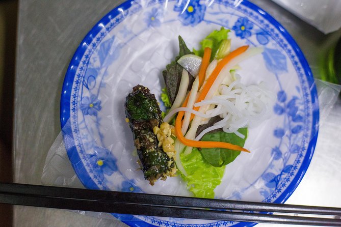 Private Street Food Evening Walking Tour in Ho Chi Minh City - A flower market finish adds local color