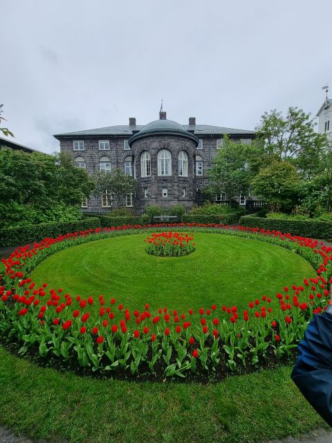 Reykjavik: City Walking tour in Small Group with Local Guide - Tjörnin, the colorful houses, and a quieter side of town