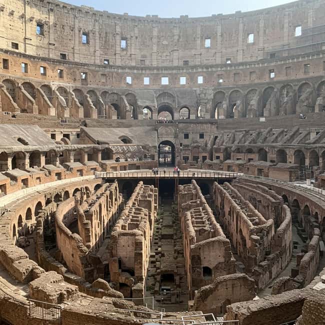 Rome: Colosseum and Ancient Rome Guided Walking Tour - Walking through the Roman Forum