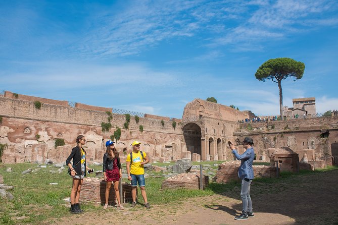 Rome: Colosseum Arena, Roman Forum & Palatine Hill Tour - Entering the Colosseum through the Gladiator’s Gate