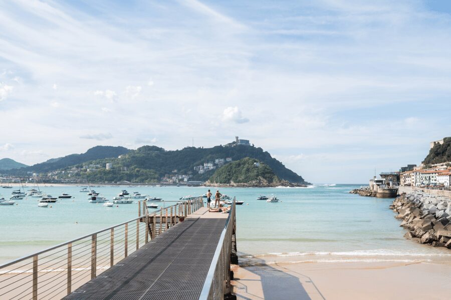 San Sebastian: Walking Tour with Pintxo and Drink - Entering the Old Town through Bretxa Market