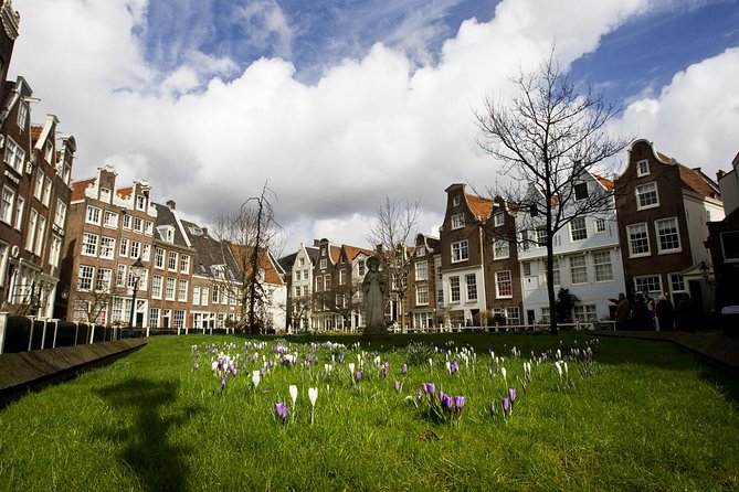 Secrets of Amsterdam Walking Tour plus Dutch Sweets Tasting - Munt Tower, a brief look at the city gates
