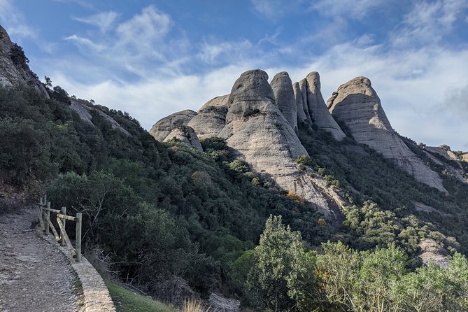 Semi-Private Montserrat Monastery, Funicular & Scenic Nature Walk - Cheese, coffee, and a short return to the monastery