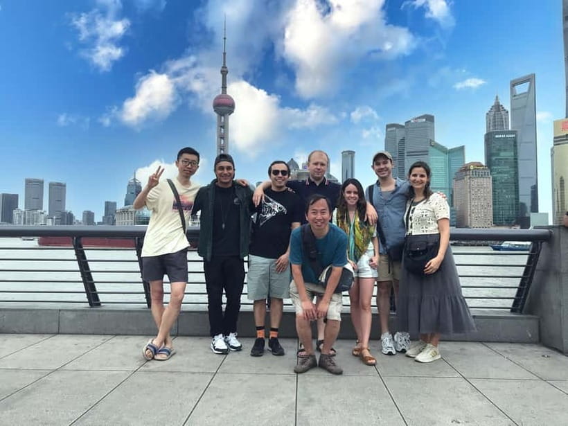 Shanghai Highlights Walking Tour With A Real Local - Nanjing Road, lane houses, and modern Shanghai
