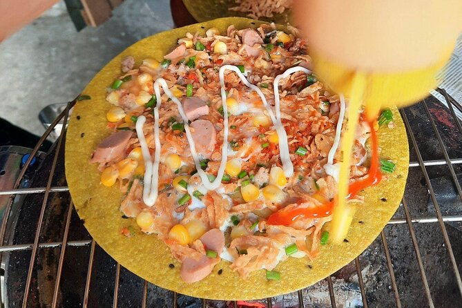 Super Niche Walking Street Food Tour in Ho Chi Minh City - Crossing streets, taking taxis, and keeping comfortable