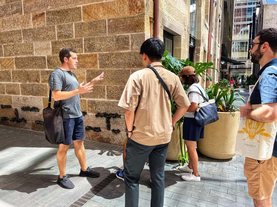Sydney: City & The Rocks 3.5-Hour Walking Tour with a Drink - The Opera House and Harbour Bridge finale