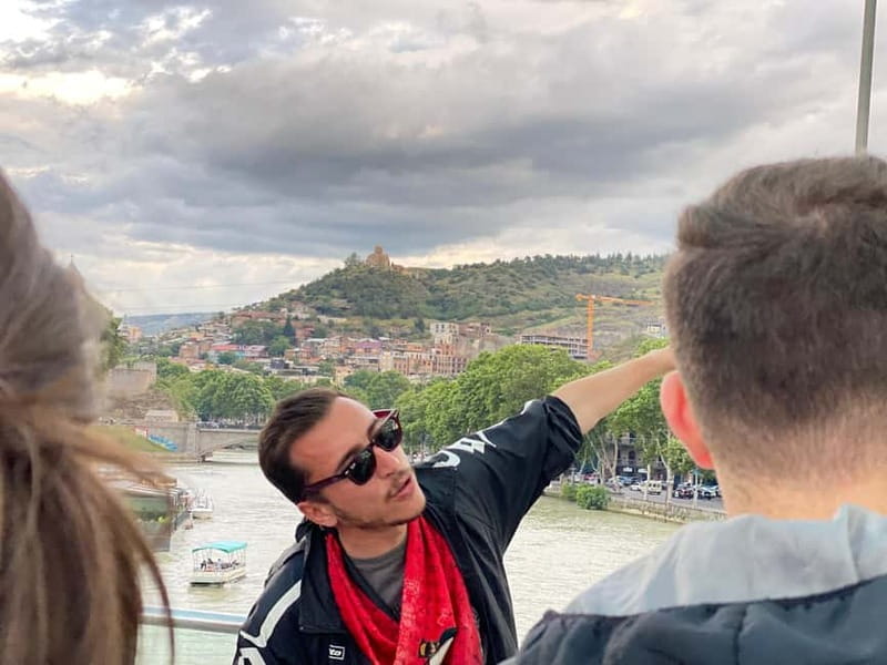 Tbilisi: Evening Walking Tour with Wine & Boat Ride Options - Peace Bridge after dark