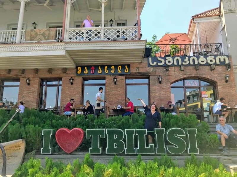 Tbilisi: Old Town Walking Tour - Must-See Attractions - The Peace Bridge and old meets new