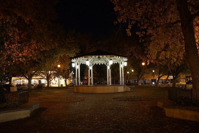 The Original 8pm Ghost Tour of Old Town Albuquerque - since 2001 - San Felipe de Neri Church under evening light