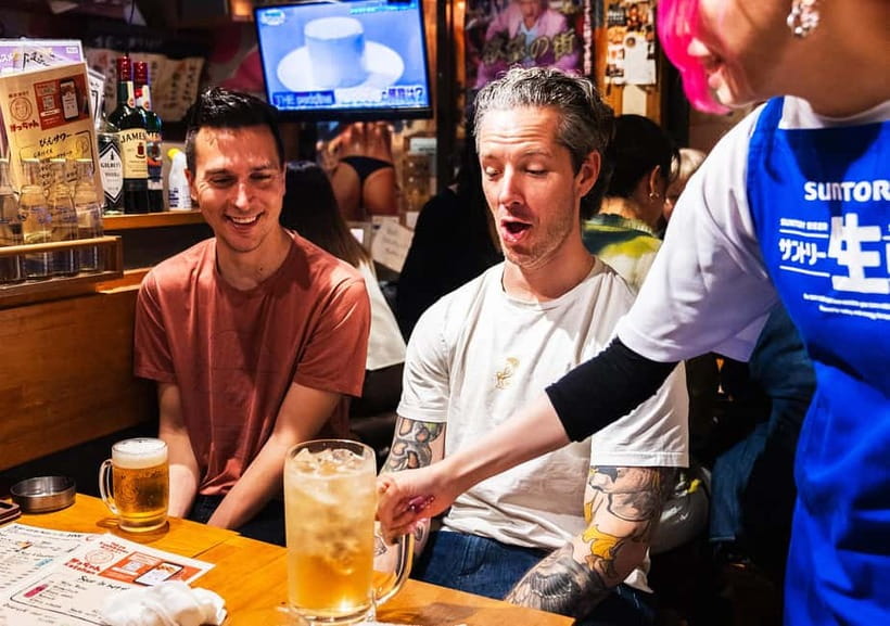 Tokyo: Shinjuku Bar Hopping & Night Walking Tour - Omoide Yokocho: red lanterns and tiny tables
