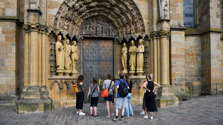 Trier: Guided Old Town Highlights and History Walking Tour - Medieval buildings and the Main Market
