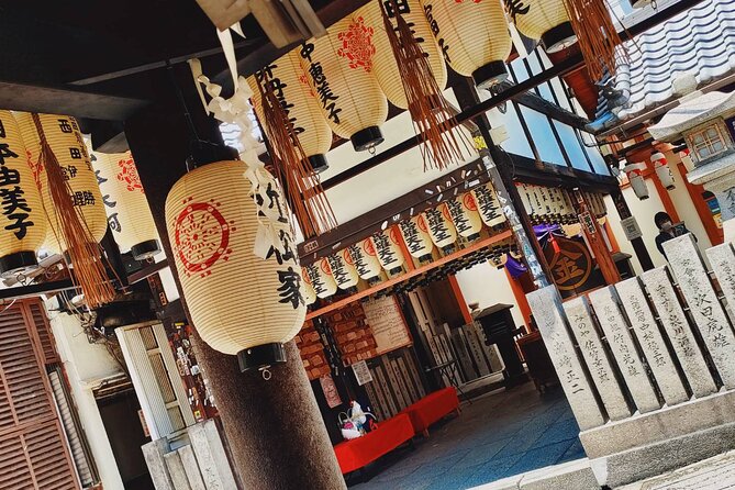 Ultimate Osaka Walking Tour: Castle, Dotonbori & Hidden Gems - Shinsekai closes with old Osaka character