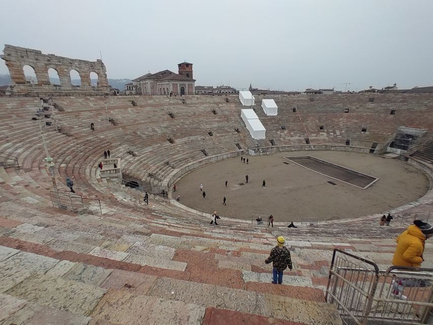 Verona: Small Group Guided Walking Tour with Arena Tickets - Piazza delle Erbe and Verona’s everyday center